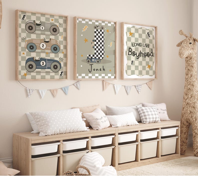 May include: Three framed prints with a racing car theme. The first print features three racing cars with numbers 1, 2, and 3. The second print features a chequered flag and the name Jonah. The third print features a chequered background with the text "Long Live Boyhood".