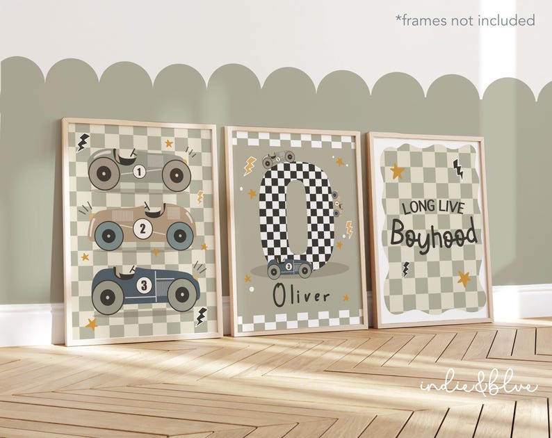 May include: Three printable wall art prints with a racing car theme. The first print features three vintage race cars with numbers 1, 2, and 3. The second print features a chequered flag design with the letter O and the name Oliver. The third print features a chequered flag design with the text "Long Live Boyhood".
