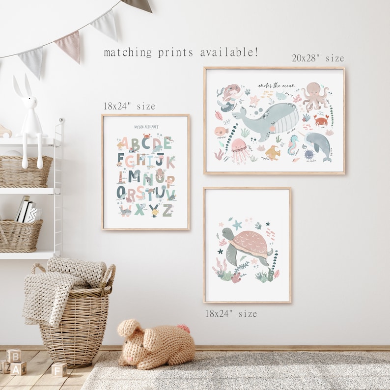 May include: Three framed prints with a nautical theme. The top print is 20x28 inches and features a whale, octopus, and other sea creatures with the text "Under the Sea". The two prints below are 18x24 inches and feature an alphabet chart and a turtle swimming in the ocean.