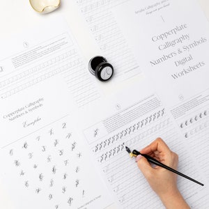 May include: A set of digital worksheets for copperplate calligraphy featuring numbers and symbols. The worksheets include an exemplar of each number and symbol, as well as practice lines for writing. The image shows a person practicing calligraphy with a dip pen and ink.
