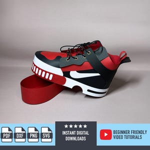 May include: A red, black, and white sneaker with a distinctive design. The shoe has a red upper, black details, and a white sole. The shoe is presented on a red platform. The image also includes the text "INSTANT DIGITAL DOWNLOADS" and "BEGINNER FRIENDLY VIDEO TUTORIALS".