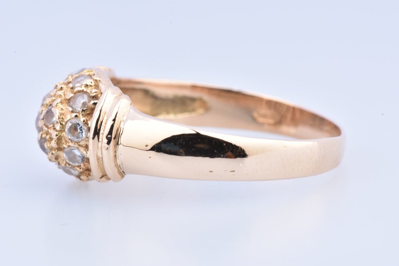 embellished with zirconium. 750 thousandths 18-carat yellow gold ring