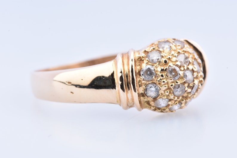 embellished with zirconium. 750 thousandths 18-carat yellow gold ring