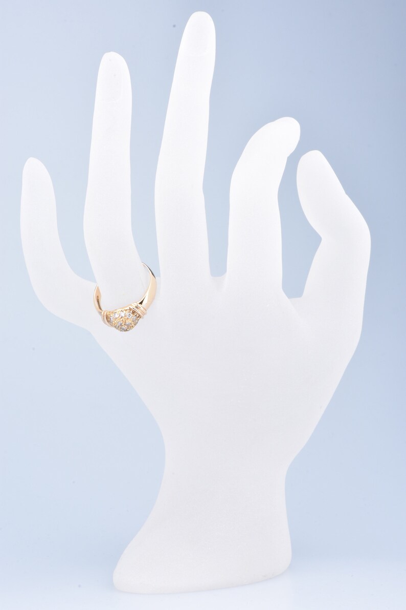embellished with zirconium. 750 thousandths 18-carat yellow gold ring