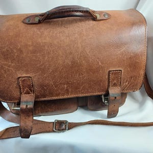 Mallette en cuir robuste, cartable vintage d'occasion