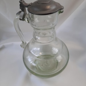 decorative glass carafe, wine jug, glass jug with tin lid, antique water jug