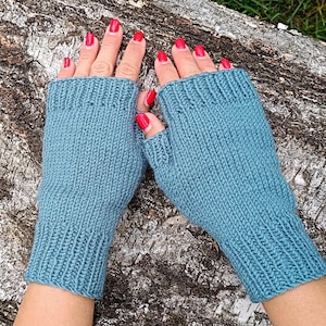 May include: A rustic wooden sign with the text "Welcome to our porch" in white lettering. The sign features a distressed finish and a simple, inviting design, perfect for outdoor decor.