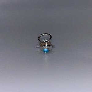 Hübscher Patty Charm in Silber und Blautopas