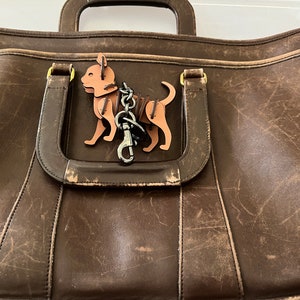 Coach vintage d'occasion - Porte-documents/sac à bandoulière Embassy des années 1990 - Porte-clés chat fantaisie Coach