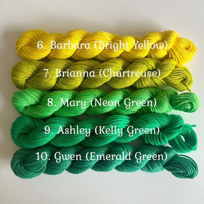 May include: Five skeins of embroidery floss in shades of yellow and green. The skeins are labeled with numbers and color names: 6. Barbara (Bright Yellow), 7. Brianna (Chartreuse), 8. Mary (Neon Green), 9. Ashley (Kelly Green), 10. Gwen (Emerald Green).
