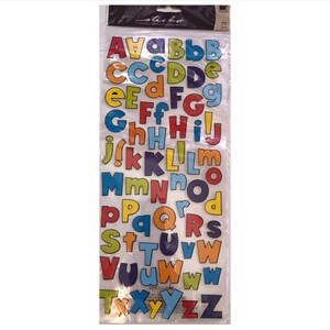 May include: A sheet of colorful alphabet stickers with 71 pieces. The letters are in a variety of colors, including red, orange, yellow, green, blue, and purple. The stickers are perfect for adding a touch of fun to any project.