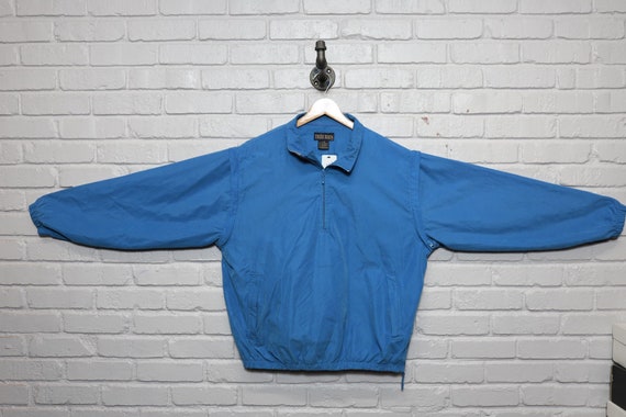 Zip off top sleeve golf jacket