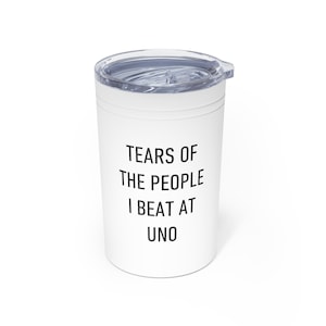 May include: White travel mug with a black lid and the text "Tears of the people I beat at Uno" printed on the side.