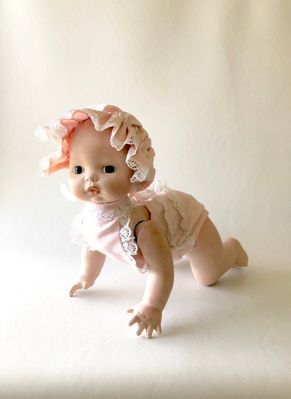 crawling baby doll