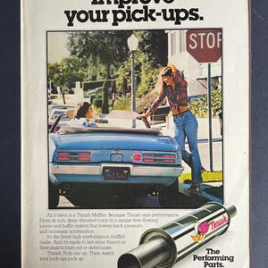 May include: Vintage advertisement featuring a blue convertible car with two people inside. The ad promotes Thrush Mufflers, with the text "Improve your pick-ups." A woman leans against the car, and a stop sign is visible.