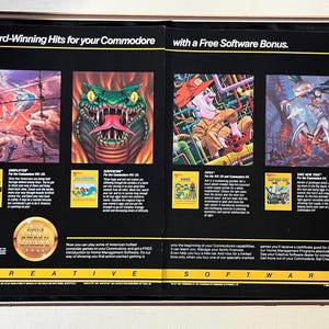 May include: A framed advertisement for Commodore computer games. The ad features colorful illustrations of game covers, including a snake, a plumber, and a futuristic scene. Text at the top reads "Award-Winning Hits for your Commodore." The bottom text reads "Creative Software."