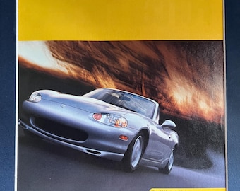 2000's Mazda Miata print advertisement To stir your soul, use the proper utensil