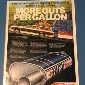 May include: A vintage advertisement for Hush Thrush mufflers. The ad features a station wagon driving on a winding road with a truck in the background. The text reads "More Guts Per Gallon" and "Hush Thrush". The ad also features a close-up of a Hush Thrush muffler.