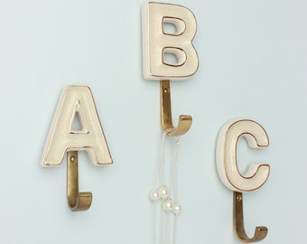 G Decor Alphabet Cream Crackle Glazed Hooks In Antique Brass Coat Hooks