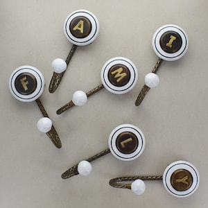 G Decor Antique Bronze Ceramic Coat Hooks