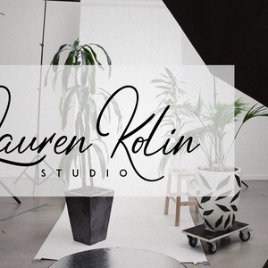 May include: A studio photography setup with two plants in pots and a white backdrop. The text "Lauren Kolin Studio" is displayed in a black cursive font.