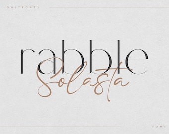 May include: A graphic design featuring the text "rabble" in a bold, sans-serif font and "solasta" in a cursive script font. The text is in black and brown on a white background.