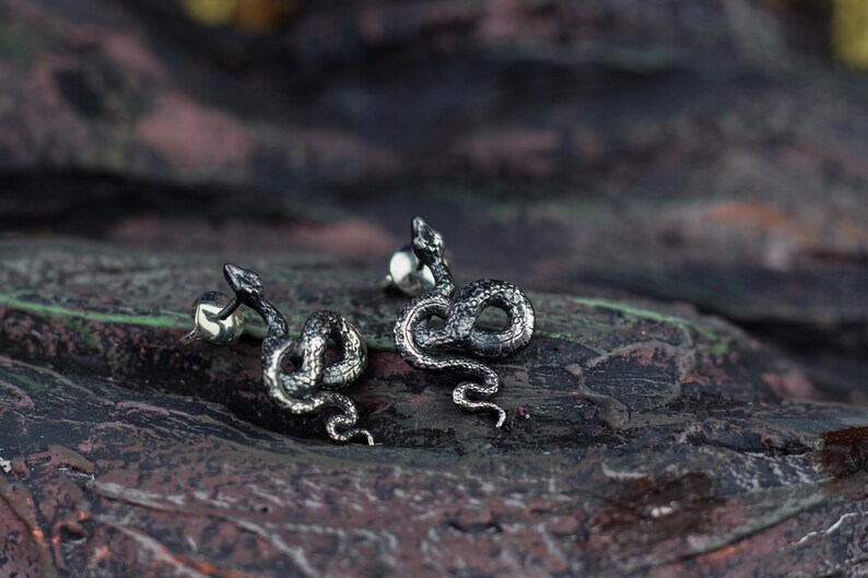 snake earrings
snake jewelry
stud earrings
gothic earrings
animal earrings
goth earrings
silver stud earrings
witchy jewelry
gothic jewelry
nature jewelry
sterling silver
screw back earrings
unique earrings