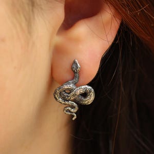 snake earrings
snake jewelry
stud earrings
gothic earrings
animal earrings
goth earrings
silver stud earrings
witchy jewelry
gothic jewelry
nature jewelry
sterling silver
screw back earrings
unique earrings