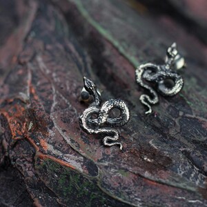snake earrings
snake jewelry
stud earrings
gothic earrings
animal earrings
goth earrings
silver stud earrings
witchy jewelry
gothic jewelry
nature jewelry
sterling silver
screw back earrings
unique earrings