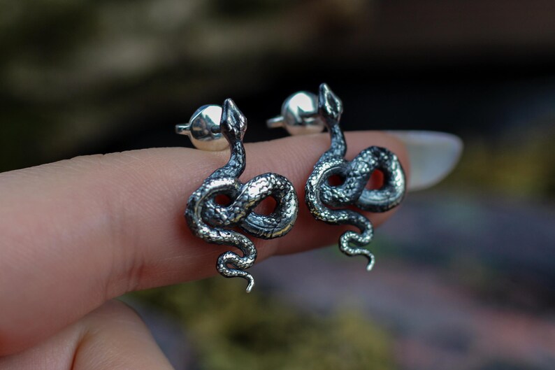 snake earrings
snake jewelry
stud earrings
gothic earrings
animal earrings
goth earrings
silver stud earrings
witchy jewelry
gothic jewelry
nature jewelry
sterling silver
screw back earrings
unique earrings