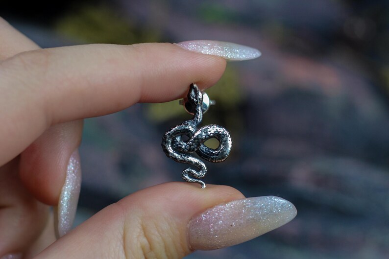 snake earrings
snake jewelry
stud earrings
gothic earrings
animal earrings
goth earrings
silver stud earrings
witchy jewelry
gothic jewelry
nature jewelry
sterling silver
screw back earrings
unique earrings