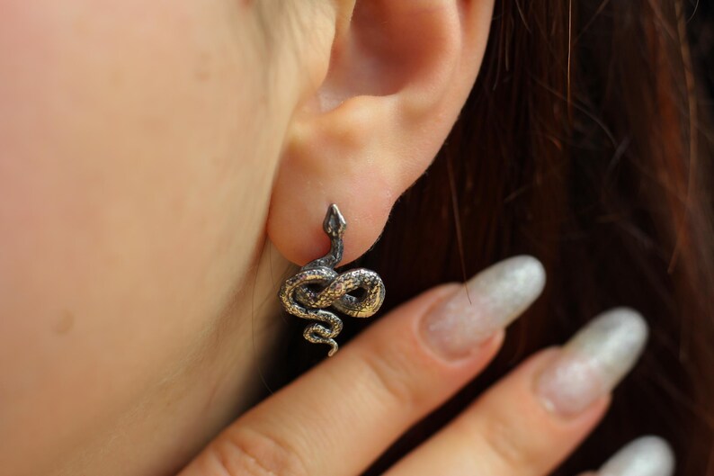 snake earrings
snake jewelry
stud earrings
gothic earrings
animal earrings
goth earrings
silver stud earrings
witchy jewelry
gothic jewelry
nature jewelry
sterling silver
screw back earrings
unique earrings