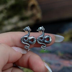 snake earrings
snake jewelry
stud earrings
gothic earrings
animal earrings
goth earrings
silver stud earrings
witchy jewelry
gothic jewelry
nature jewelry
sterling silver
screw back earrings
unique earrings