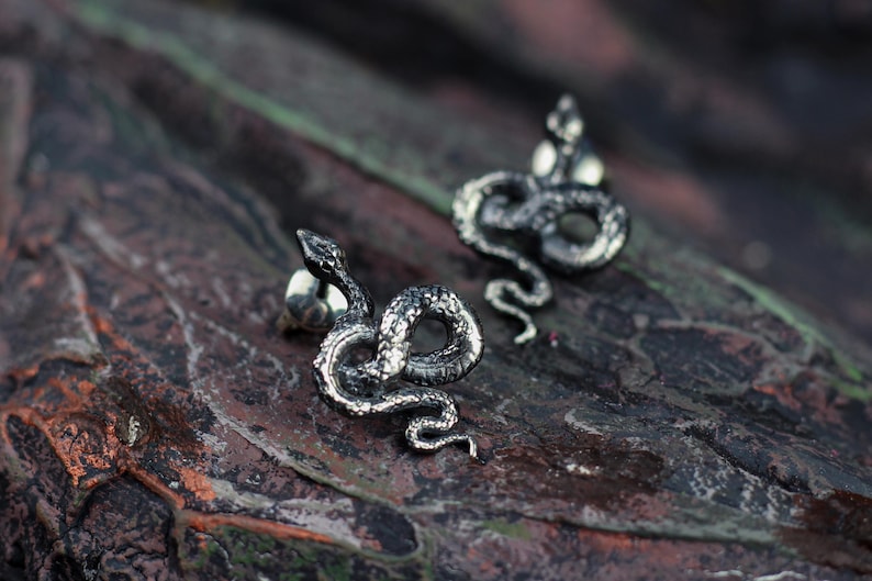 snake earrings
snake jewelry
stud earrings
gothic earrings
animal earrings
goth earrings
silver stud earrings
witchy jewelry
gothic jewelry
nature jewelry
sterling silver
screw back earrings
unique earrings