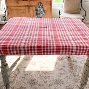 May include: A set of three ceramic nesting bowls in graduating sizes. The bowls are white with a speckled, textured finish and feature a slightly flared rim. Ideal for food preparation or serving.