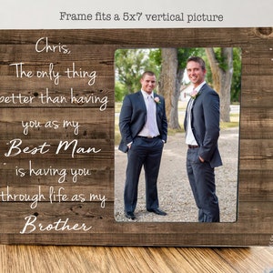 May include: A rustic wooden picture frame with a 5x7 inch vertical photo opening. The frame has a white inscription that reads "Chris, The only thing better than having you as my Best Man is having you through life as my Brother".
