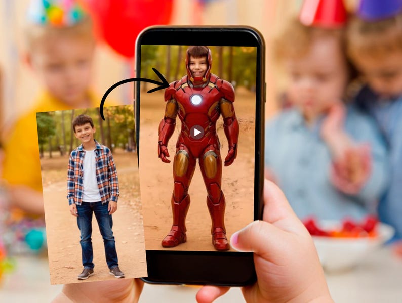 May include: A child's hand holding a smartphone displaying an image of a boy in an Iron Man costume. The costume is red and gold with a glowing chest piece. A photo of the boy in casual clothes is also visible.