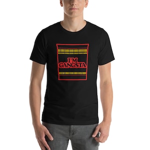 May include: A black t-shirt with a red and yellow graphic of a ramen noodle cup with the text "I'M GANGSTA" printed on it.