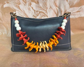 Tri-Ombre Puakenikeni Bag Lei