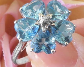 Blue Topaz Flower Ring: 6.5 Carat Heart Cut Gemstone, Diamond Accent, 14k White Gold