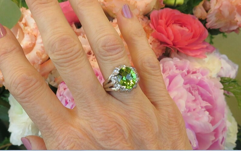 Hand View of Split Shank Statement Peridot Ring with 4 carat Fine Quality Peridot in 14k