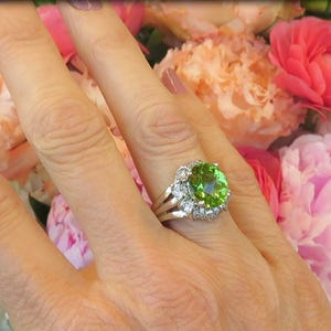 Checkerboard Cut Peridot Ring with Floral Style Diamond Halo Setting in 14k white gold
