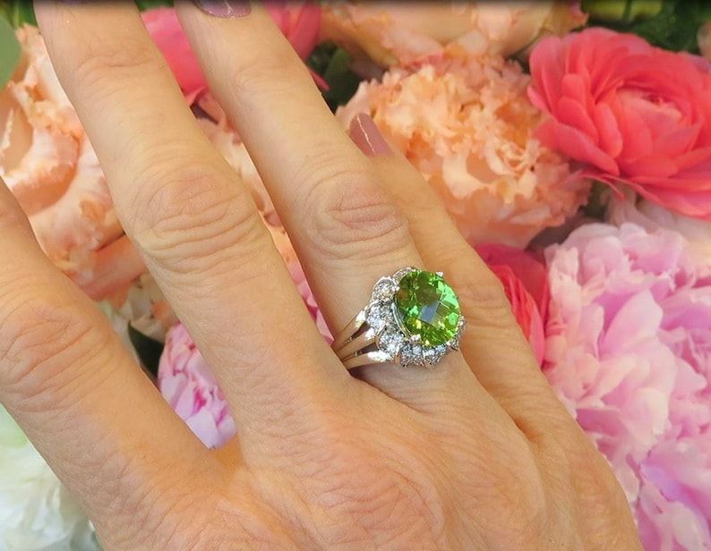 Checkerboard Cut Peridot Ring with Floral Style Diamond Halo Setting in 14k white gold