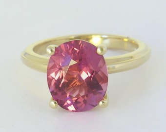 Natural Oval Pink Tourmaline Solitaire Ring: 14k Yellow Gold, Nigerian Gem