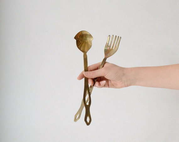 hanging brass serving utensils