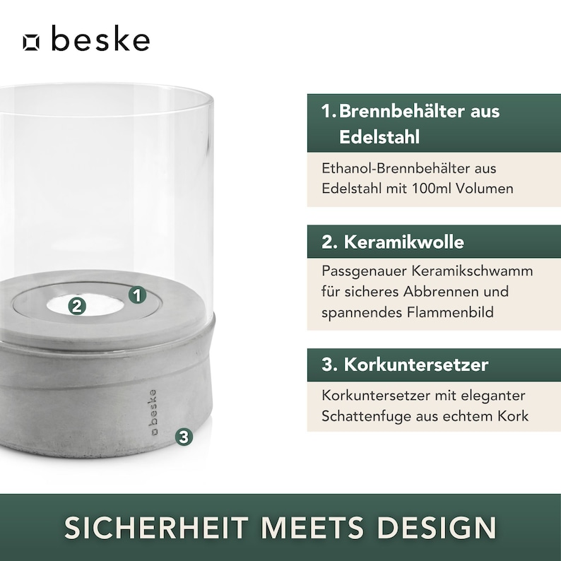 May include: A gray concrete candle holder with a glass cylinder and a cork base. The candle holder is labeled with the numbers 1, 2, and 3. The text "SICHERHEIT MEETS DESIGN" is printed below the candle holder.
