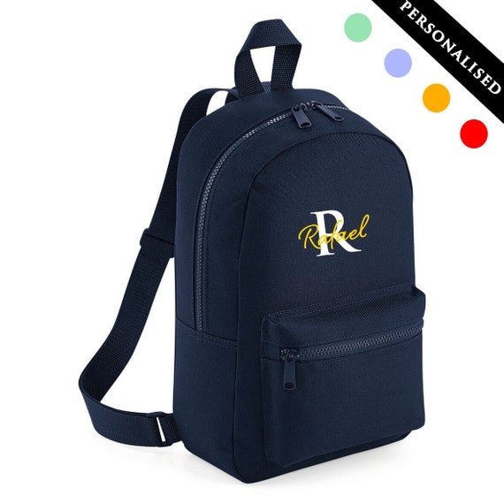 the girl with the blue backpack