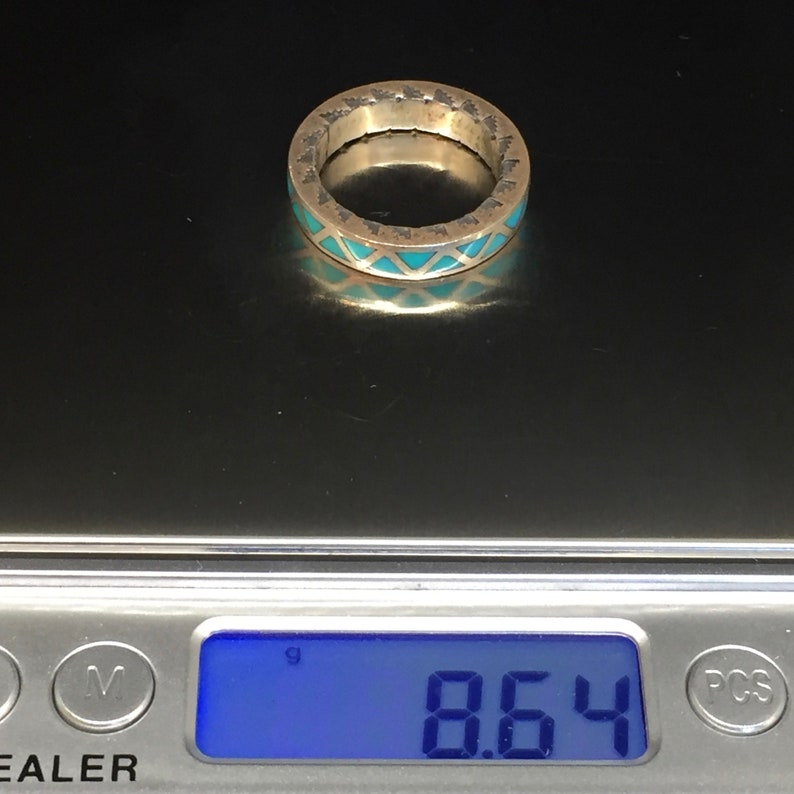 size 9 34 Silver and Turquoise ring by Nelvin Chee