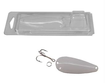 May include: A white fishing lure with a single treble hook. The lure is packaged in a clear plastic blister pack.