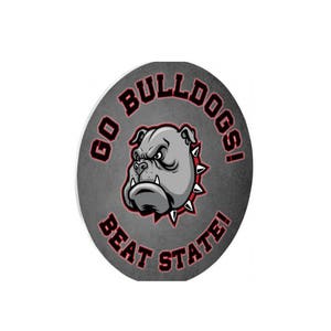 May include: A gray circle with the words "Go Bulldogs! Beat State!" in red and black text. A cartoon bulldog with a red collar is in the center of the circle.